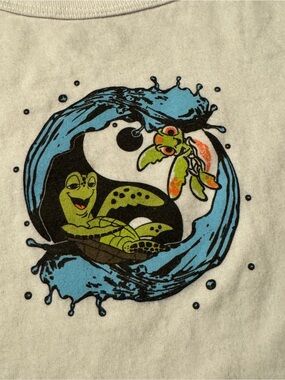 Pixar Kids’ White Graphic Crop Tee with Squirt and Crush in Ocean Scene